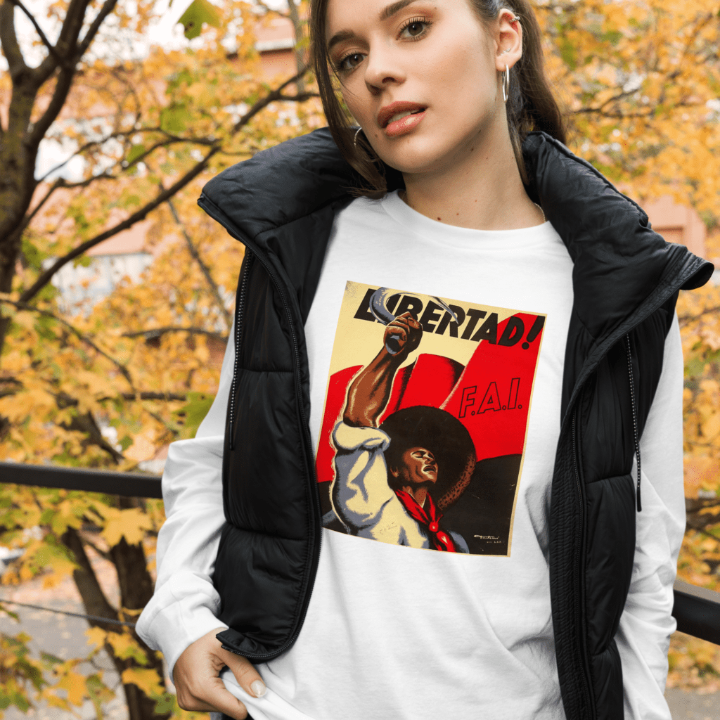 Libertad! unisex long sleeve tee available at https://shop.pvsmagazine.com/products/libertad-unisex-long-sleeve-tee